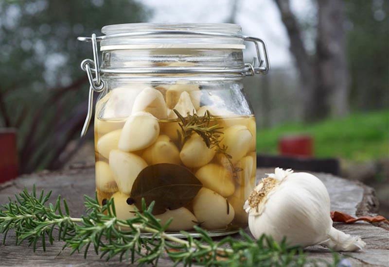 Rượu tỏi trị bệnh gì